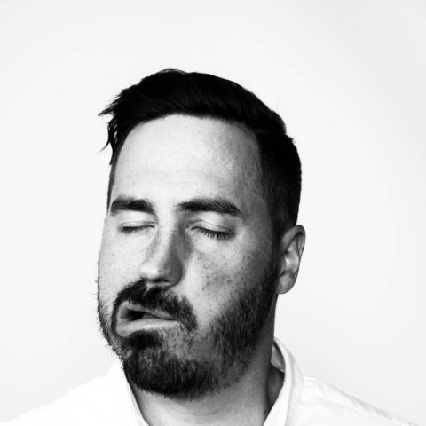 John Mark Lowry — black and white portrait, eyes closed